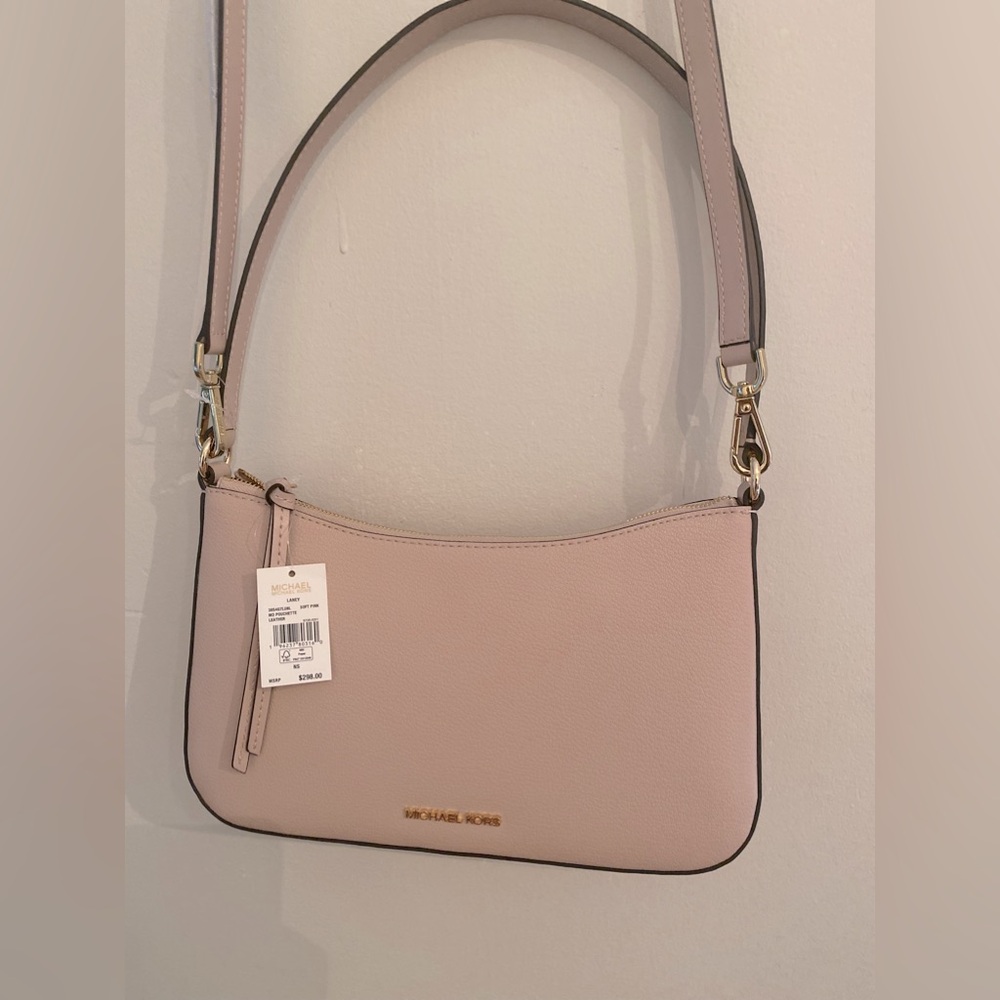Michael Kors soft pink crossbody leather handbag.